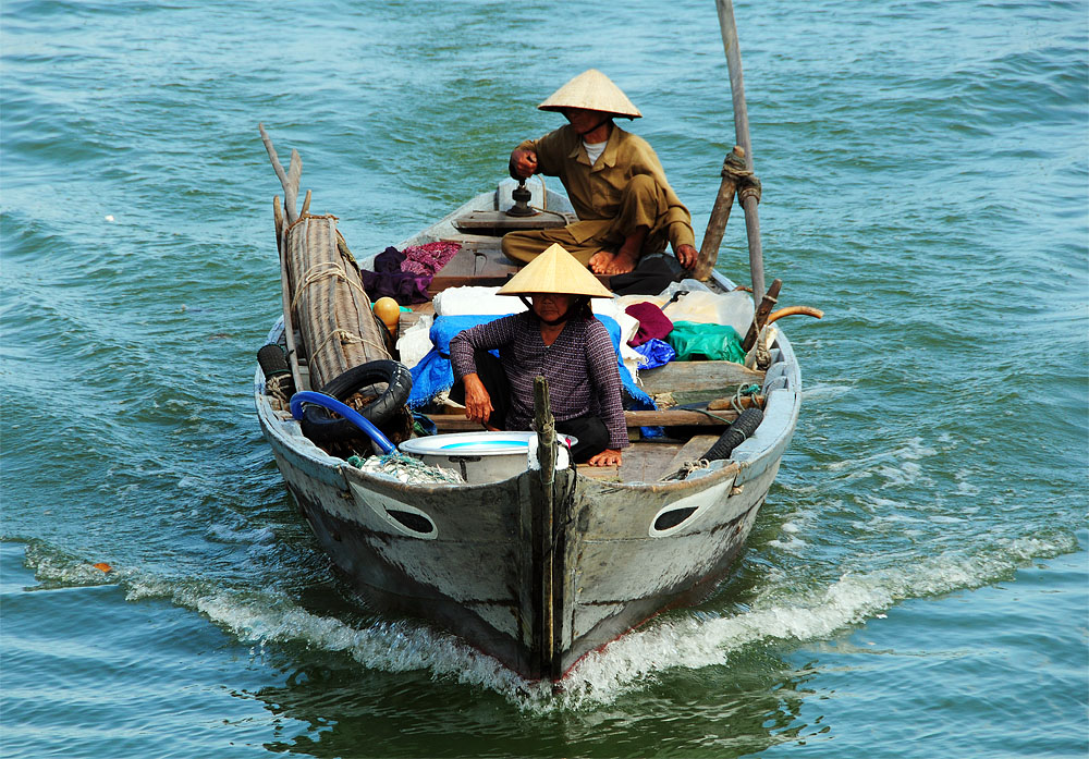 Family boat on the Mekong river (Mekong Delta)